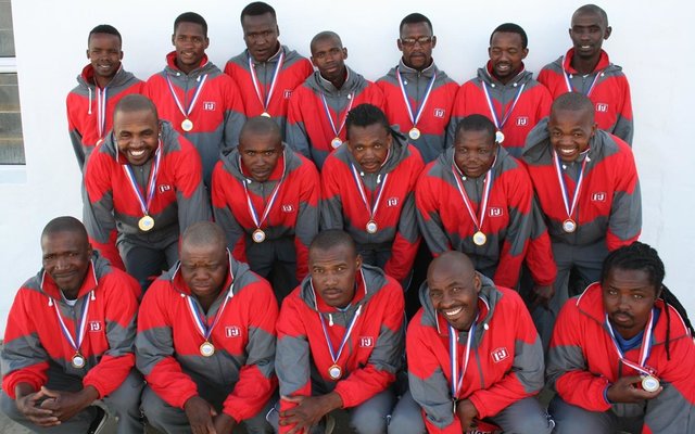  The Team:  At the back fltr: Sayinile Mkolo, Anele Moss, Charles Nkonzo, Kwanele Gqwaka ,Luyanda Sikhephe, Xolisani Matiwane Thembinkosi Simani (Coach of the Team). Middle fltr: Luvuyo September (Manager of the Team), Abongile Zonke, Phumzile Mfuleni, Lifa Maphasa, Aviwe Mfuleni.  Front ltr: Lwando Stark, Vuyisani Pito, Mafika Wambi, Andries Ngakana, Themba Mtshakazana (Captain of the Team).